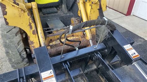 skid steer hydraulic hose holder